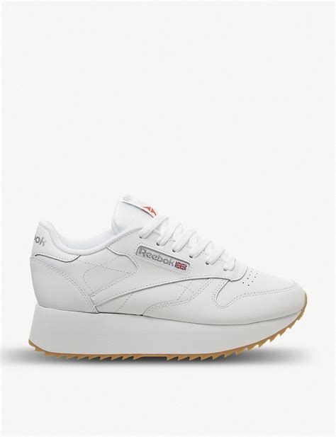 reebok platform white sneakers.